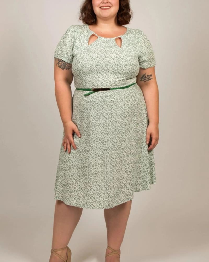 Front of a model wearing a size 3X Celeste Dress Belt Include Cut-Out Detail in Green by ANNICK. | dia_product_style_image_id:309316